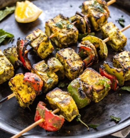 Boneless Chicken marinated with mint paste and aromatic spices grilled in Oven.
